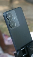a close up of a cell phone on a tripod